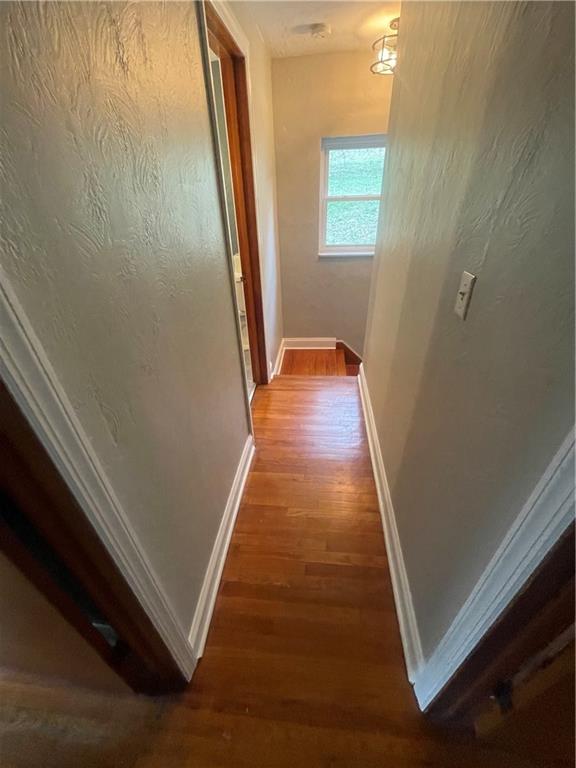 1815 Sample Road Allison Park, PA 15101 - Photo 23 of 40 a view of a hallway with wooden floor