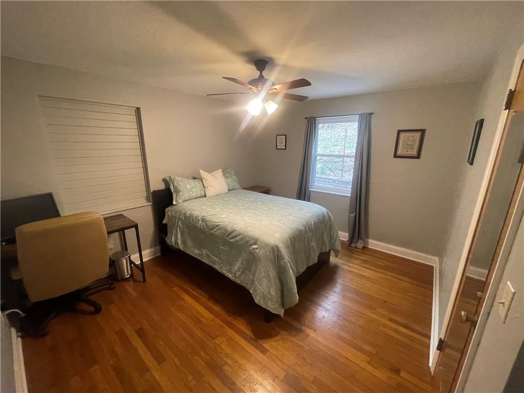 1815 Sample Road Allison Park, PA 15101 - Photo 30 of 40 a bedroom with a bed and a couch