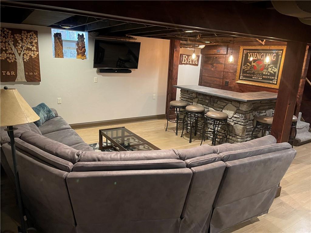 1815 Sample Road Allison Park, PA 15101 - Photo 36 of 40 a living room with furniture and a flat screen tv