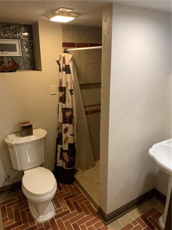 1815 Sample Road Allison Park, PA 15101 - Photo 38 of 40 a bathroom with a toilet and a shower