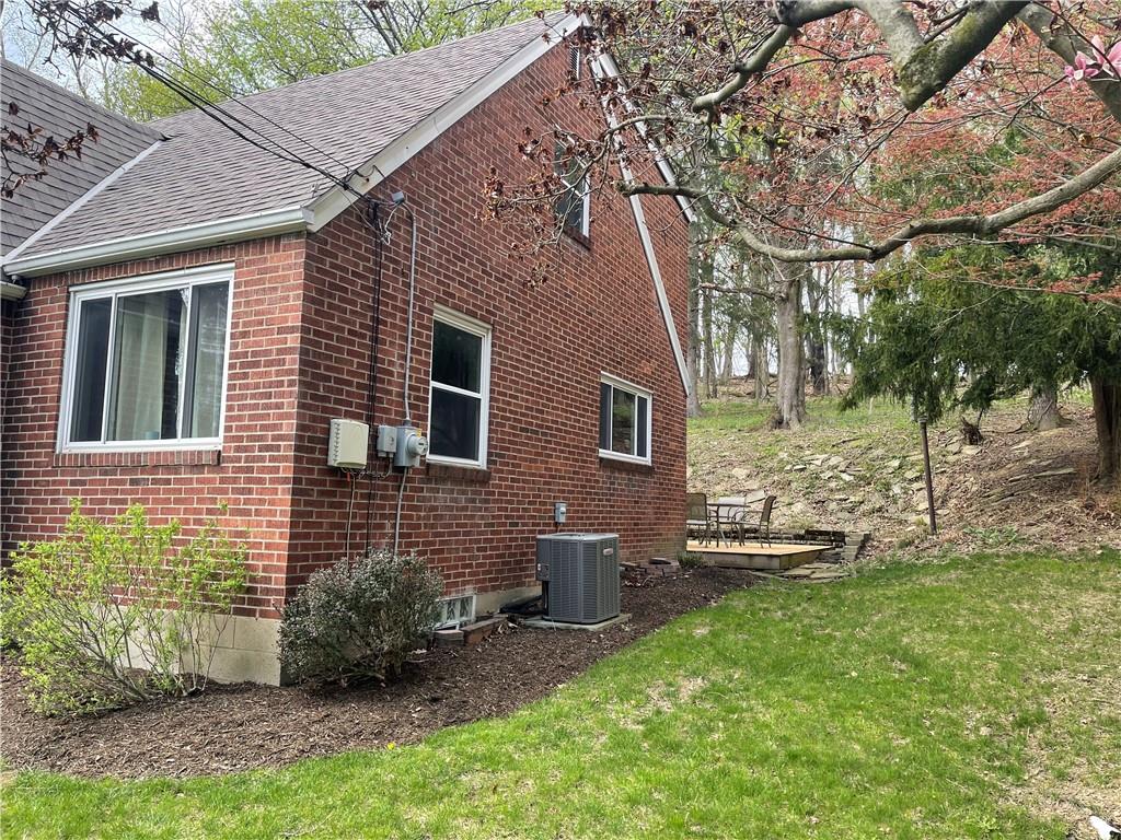1815 Sample Road Allison Park, PA 15101 - Photo 4 of 40 a backyard of a house with table and chairs