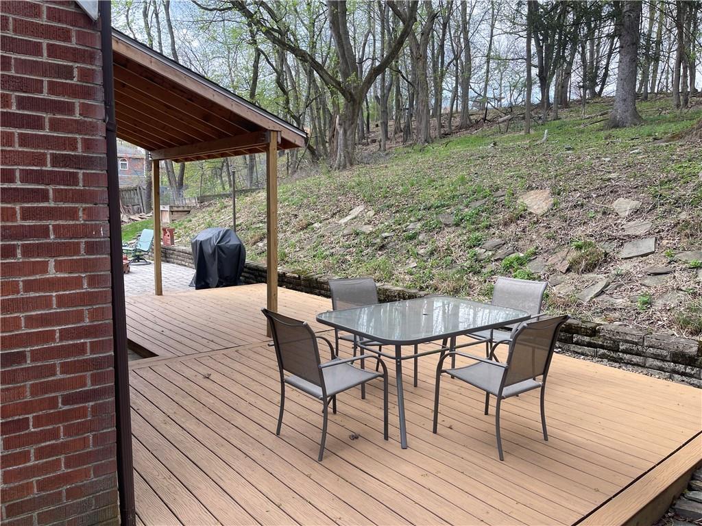 1815 Sample Road Allison Park, PA 15101 - Photo 5 of 40 a view of a patio with a table chairs and a patio