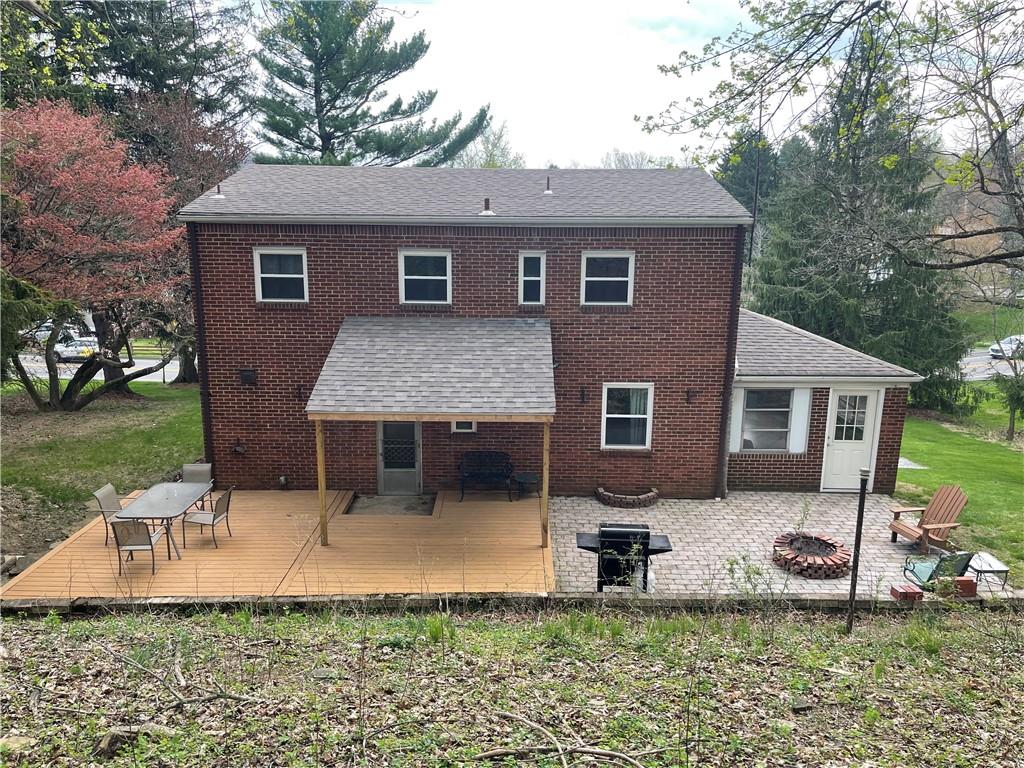 1815 Sample Road Allison Park, PA 15101 - Photo 8 of 40 a front view of a house with garden