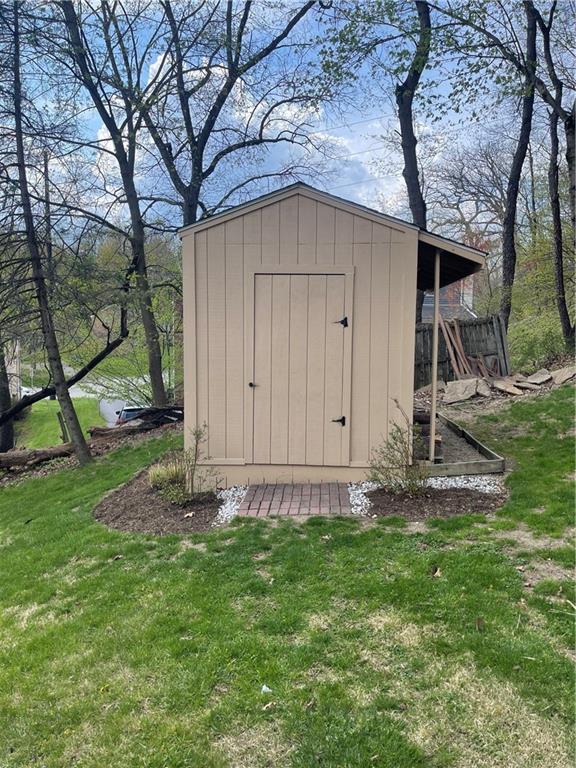 1815 Sample Road Allison Park, PA 15101 - Photo 10 of 40 a backyard of a house with lots of green space