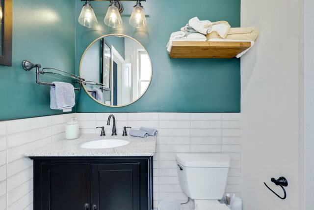 4730 North Malden Street, Unit 3 Chicago, IL 60640 - Photo 14 of 25 a bathroom with a sink and a mirror