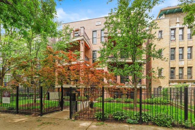 4730 North Malden Street, Unit 3 Chicago, IL 60640 - Photo 2 of 25 front view of a building with a garden