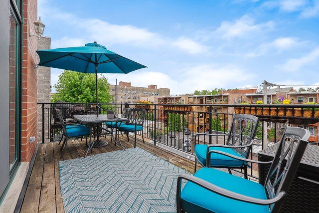 4730 North Malden Street, Unit 3 Chicago, IL 60640 - Photo 22 of 25 a view of a roof deck with furniture