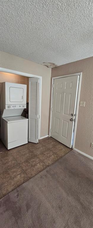 a view of a big room with a cabinet and a mirror