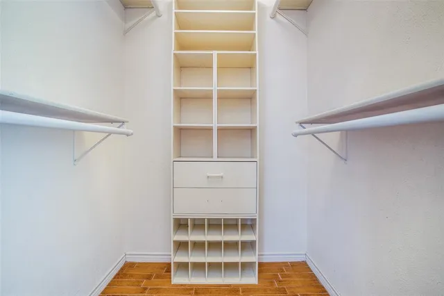 a view of an empty walk in closet