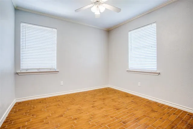 a view of a room with a large window