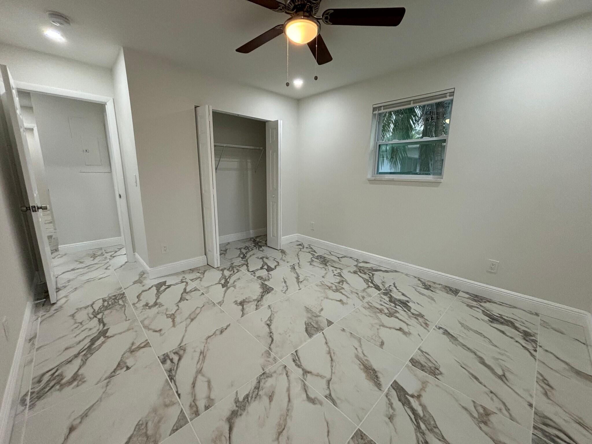 800 Southwest 7th Street Hallandale Beach, FL 33009 - Photo 8 of 9 a view of a bedroom