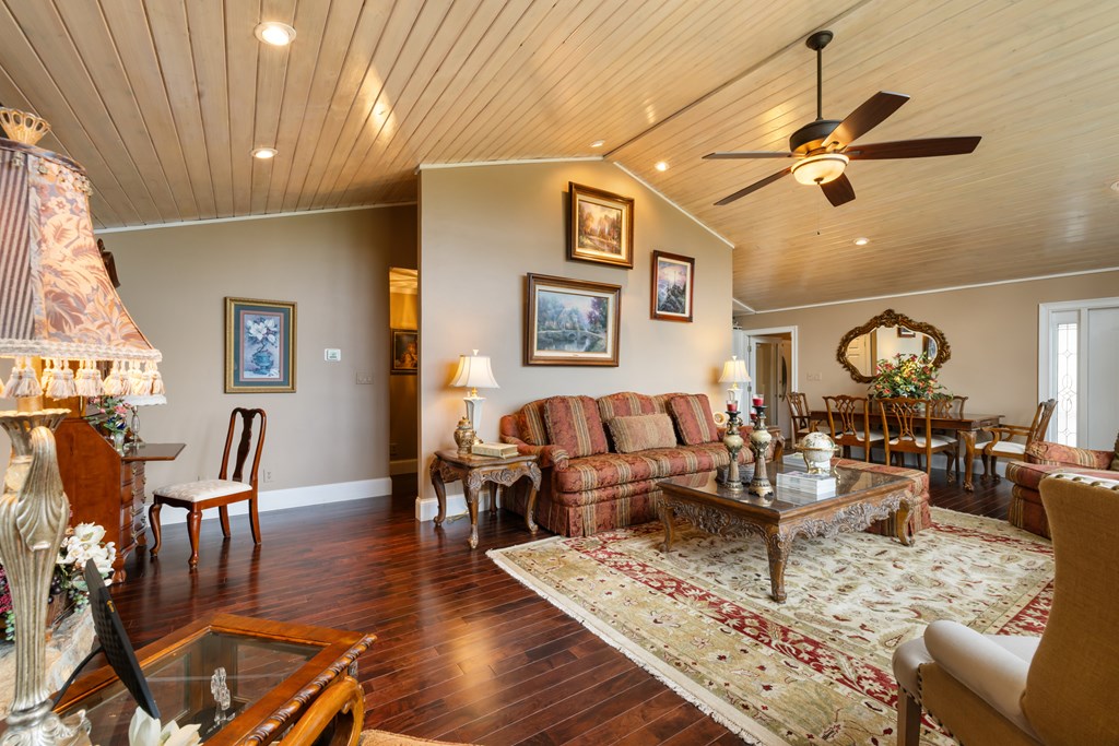 1396 Deerfield Road Young Harris, GA 30582 - Photo 11 of 60 a living room with furniture and wooden floor