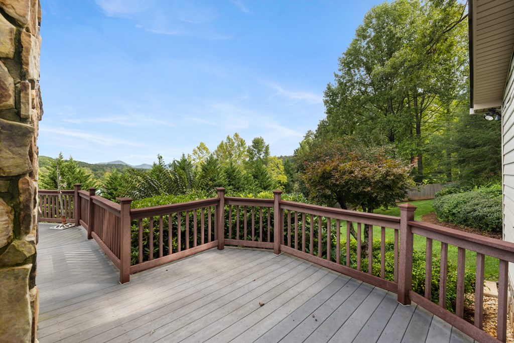 1396 Deerfield Road Young Harris, GA 30582 - Photo 24 of 60 a view of balcony with wooden floor and fence