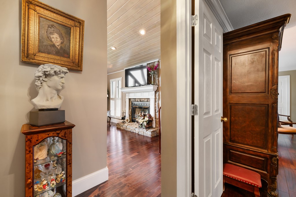 1396 Deerfield Road Young Harris, GA 30582 - Photo 30 of 60 a view of a hallway with wooden floor and workspace