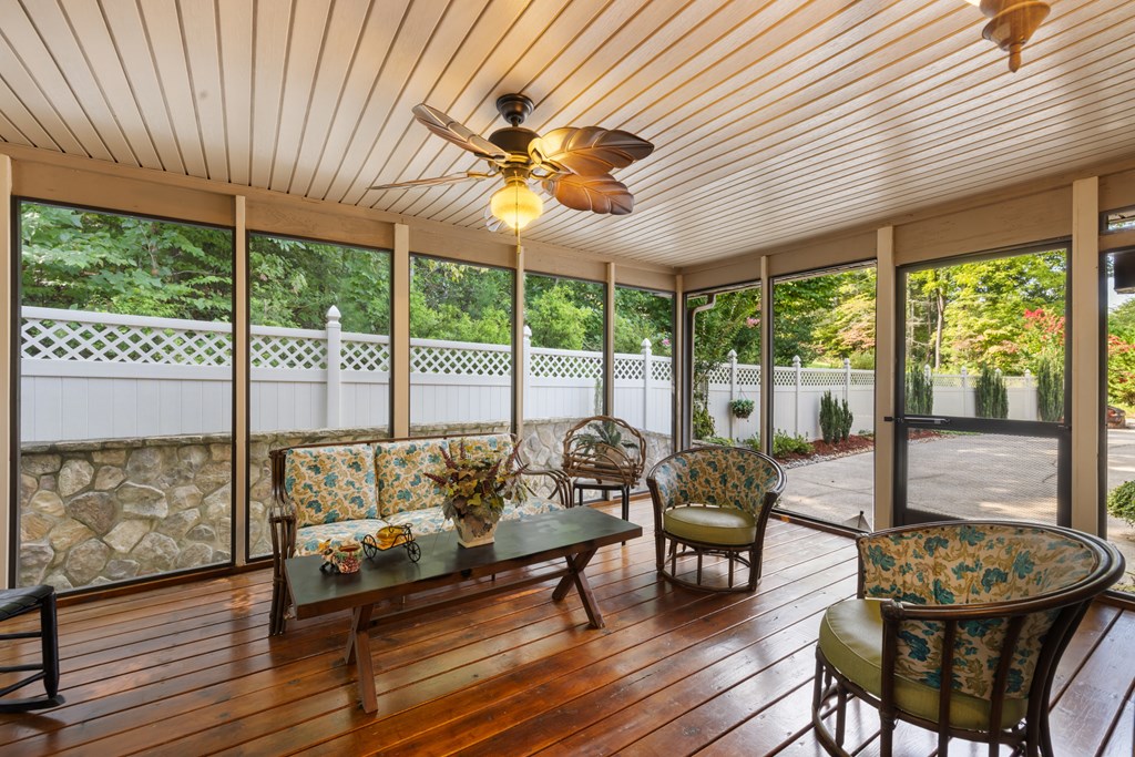 1396 Deerfield Road Young Harris, GA 30582 - Photo 38 of 60 a living room with furniture and a large window