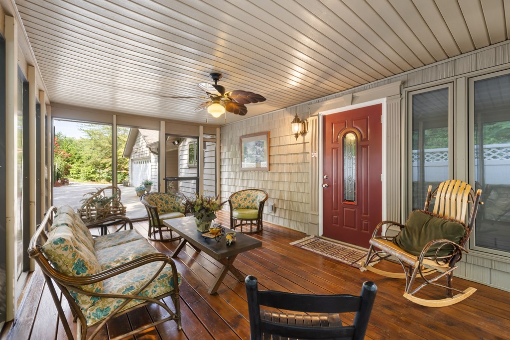 1396 Deerfield Road Young Harris, GA 30582 - Photo 39 of 60 a view of a dining room with furniture window and outside view