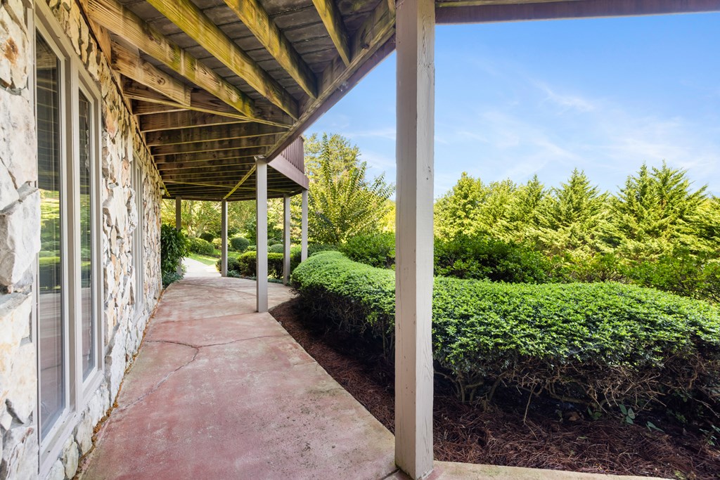 1396 Deerfield Road Young Harris, GA 30582 - Photo 46 of 60 a view of a backyard with garden