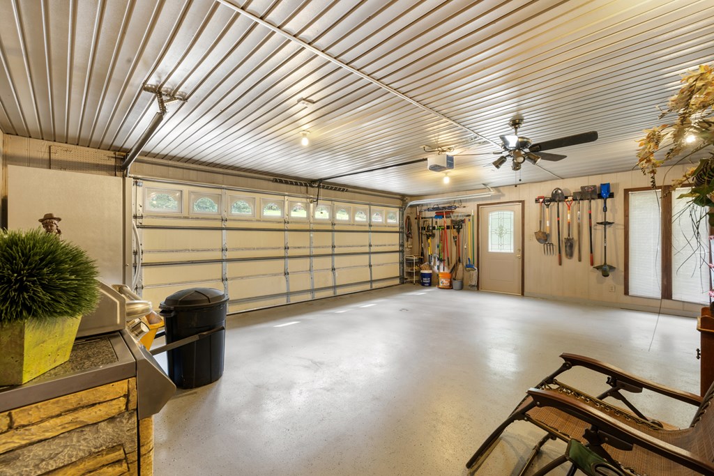 1396 Deerfield Road Young Harris, GA 30582 - Photo 54 of 60 a view of a garage with furniture