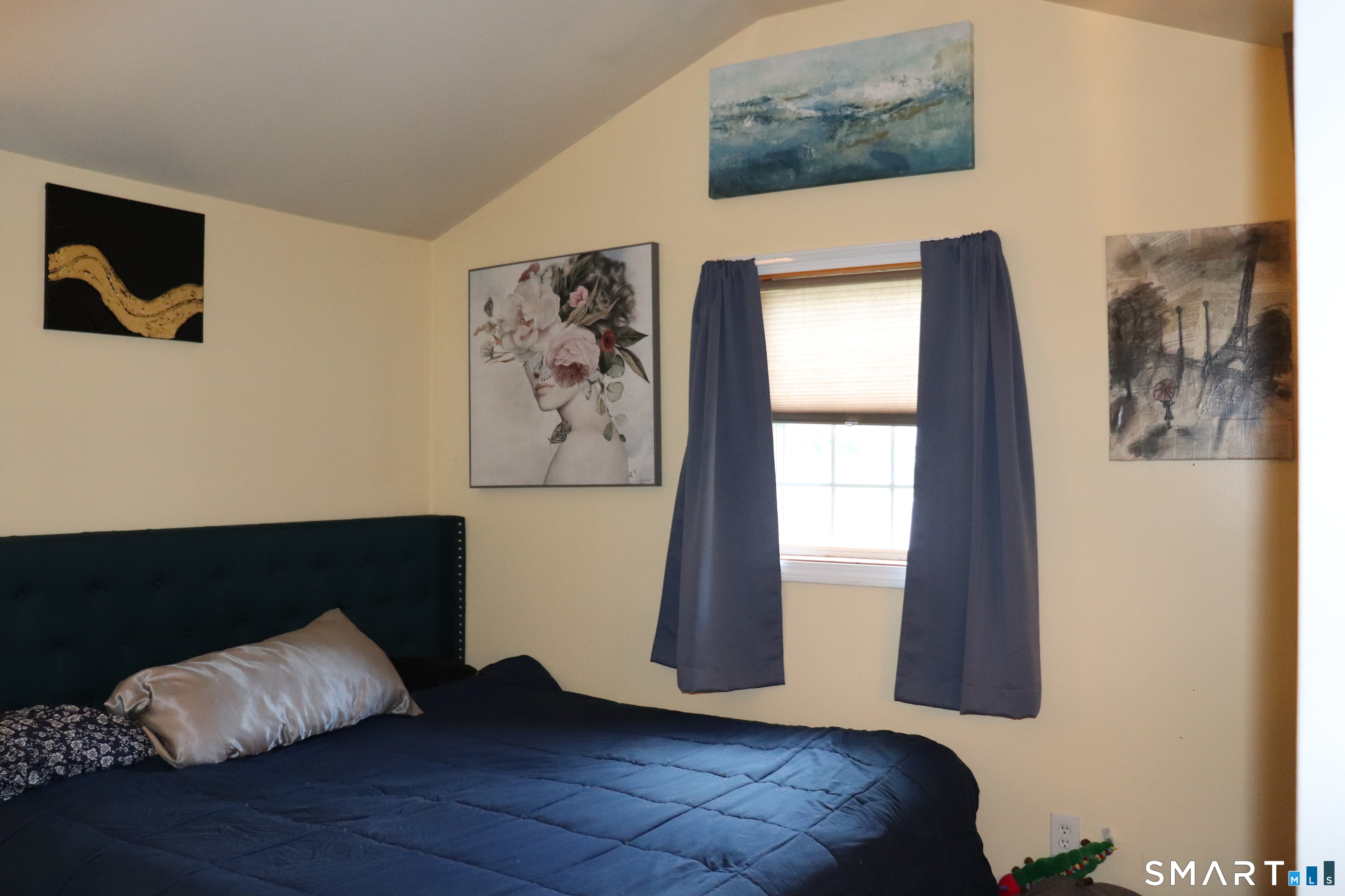 308 Abbe Road Enfield, CT 06082 - Photo 20 of 33 a bedroom with a bed and a window