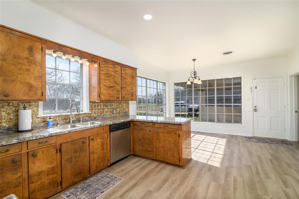 13040 Adger Road Gilliam, LA 71029 - Photo 11 of 29 a large white kitchen with a large window