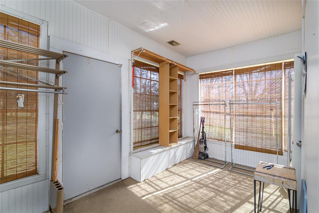 13040 Adger Road Gilliam, LA 71029 - Photo 18 of 29 a view of an empty room with a birdcage and a window
