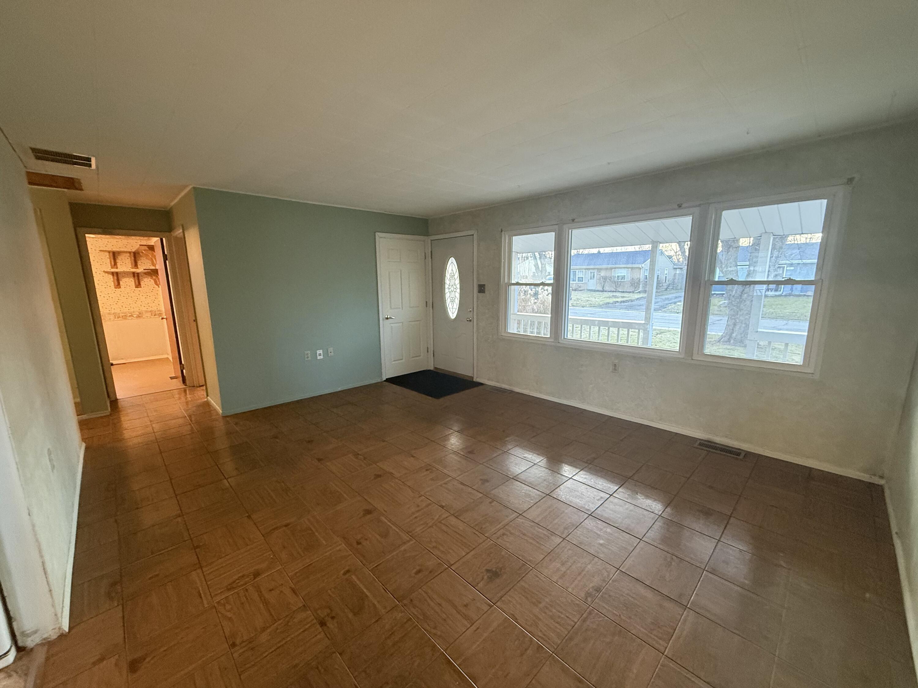 733-1 Imperial Road Valparaiso, IN 46385 - Photo 2 of 16 a view of an empty room with a window