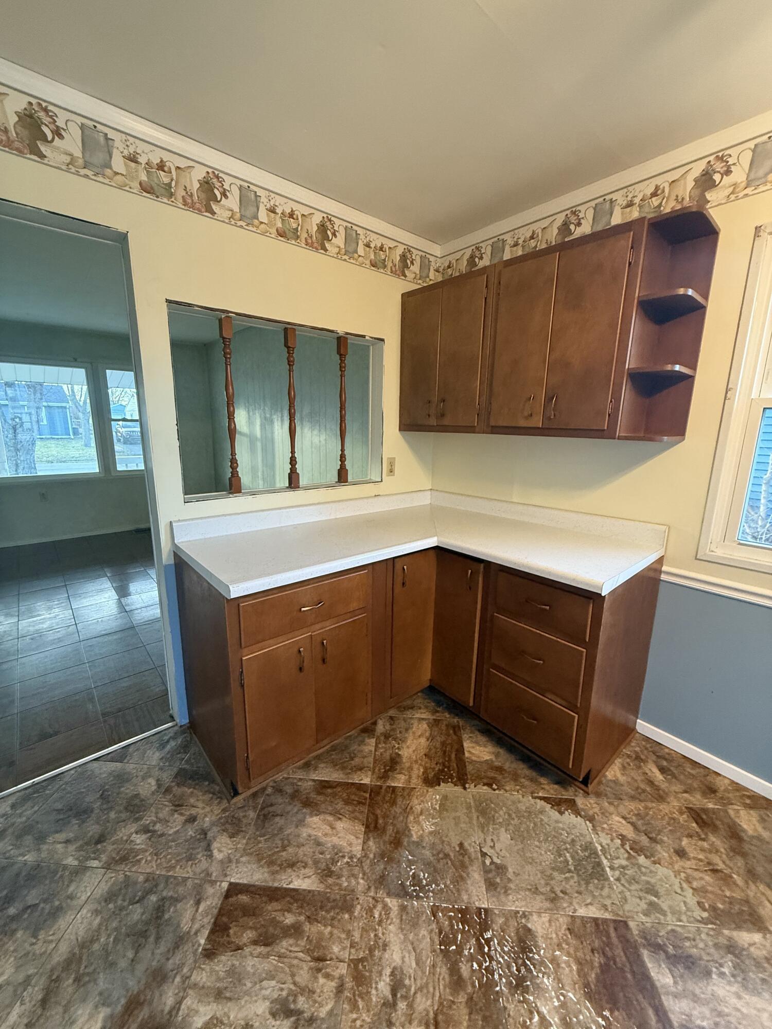 733-1 Imperial Road Valparaiso, IN 46385 - Photo 5 of 16 a kitchen with a cabinets and window