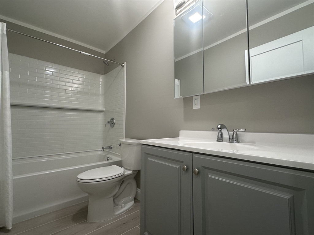 102 Wells Road Becket, MA 01223 - Photo 19 of 40 a bathroom with a sink toilet and shower