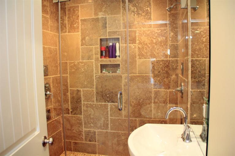 173 Sandy Beach Road Plymouth, MA 02360 - Photo 19 of 35 a bathroom with a sink and shower