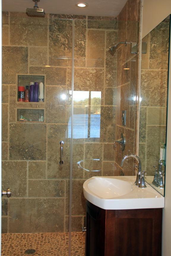 173 Sandy Beach Road Plymouth, MA 02360 - Photo 20 of 35 a bathroom with a sink shower and a mirror
