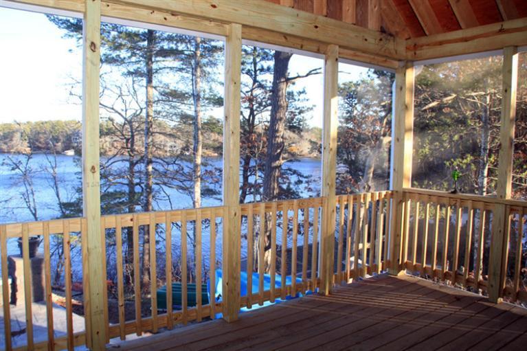 173 Sandy Beach Road Plymouth, MA 02360 - Photo 2 of 35 a view of a porch with wooden floor