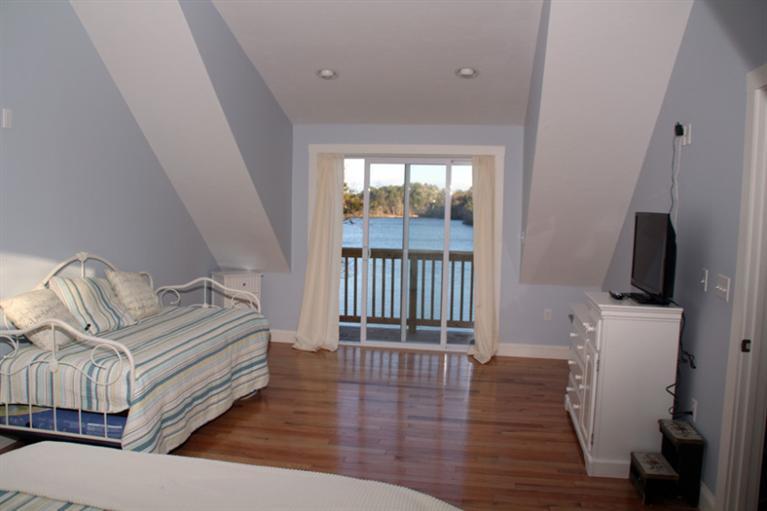 173 Sandy Beach Road Plymouth, MA 02360 - Photo 22 of 35 a view of a livingroom with wooden floor and furniture