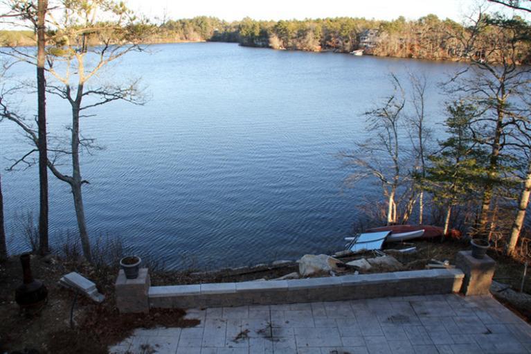 173 Sandy Beach Road Plymouth, MA 02360 - Photo 24 of 35 a view of patio with table and chairs and potted plants