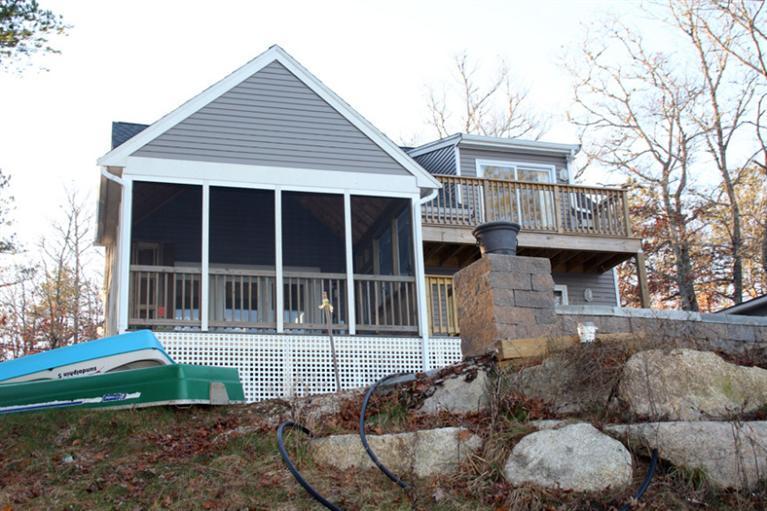 173 Sandy Beach Road Plymouth, MA 02360 - Photo 28 of 35 a front view of a house with a yard