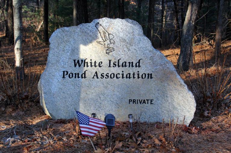 173 Sandy Beach Road Plymouth, MA 02360 - Photo 35 of 35 a sign on the side of the road