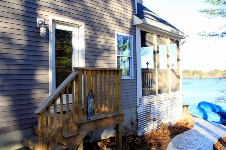 173 Sandy Beach Road Plymouth, MA 02360 - Photo 5 of 35 a view of balcony with wooden floor and seating space