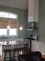 173 Sandy Beach Road Plymouth, MA 02360 - Photo 7 of 35 a kitchen with a table chairs stove and cabinets