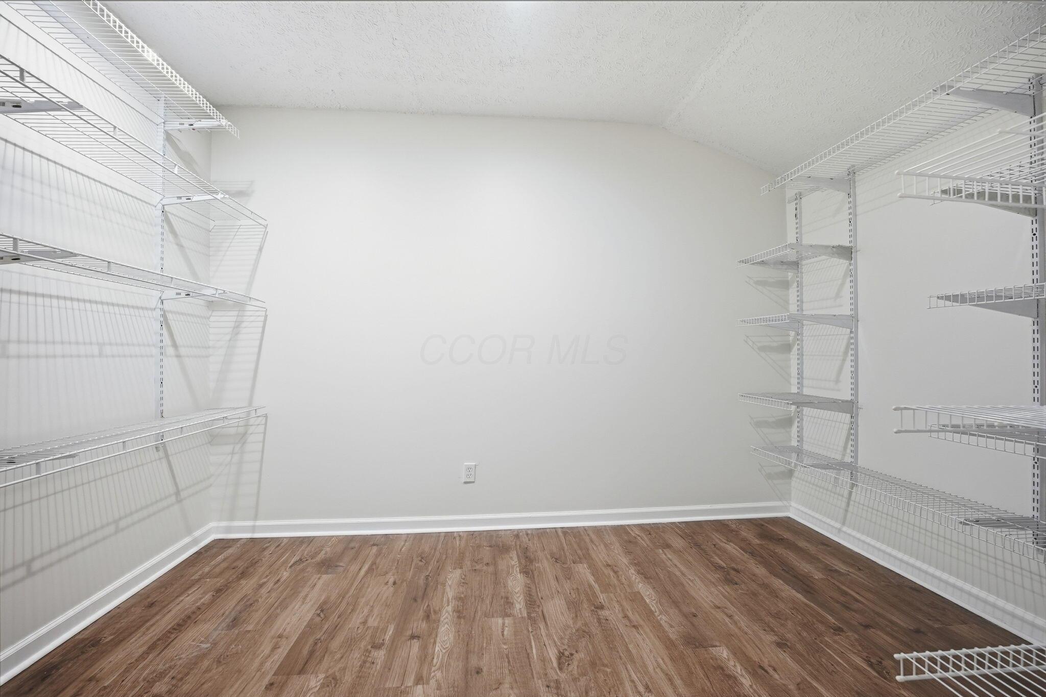 7097 Harlem Road Westerville, OH 43082 - Photo 51 of 76 ADU spacious closet with tons of built in shelving.