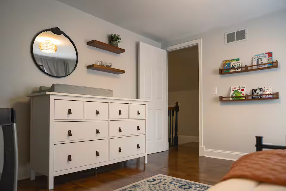 300 Division Street South Elgin, IL 60177 - Photo 21 of 23 a living room with furniture and a mirror