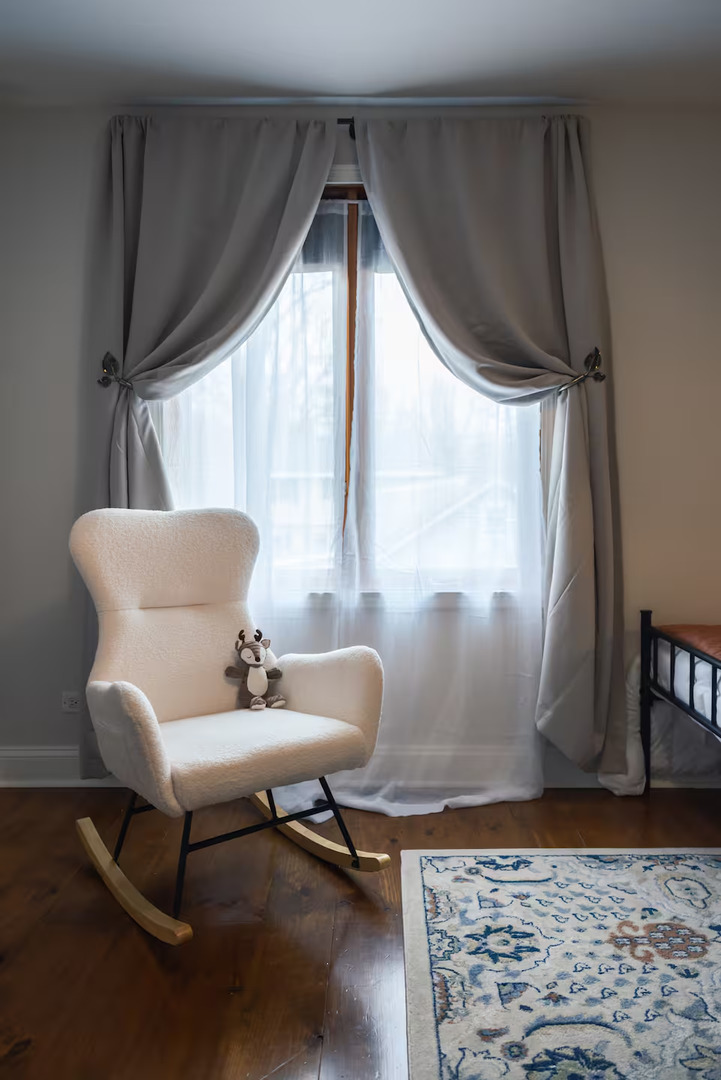 300 Division Street South Elgin, IL 60177 - Photo 22 of 23 a living room with furniture and a window