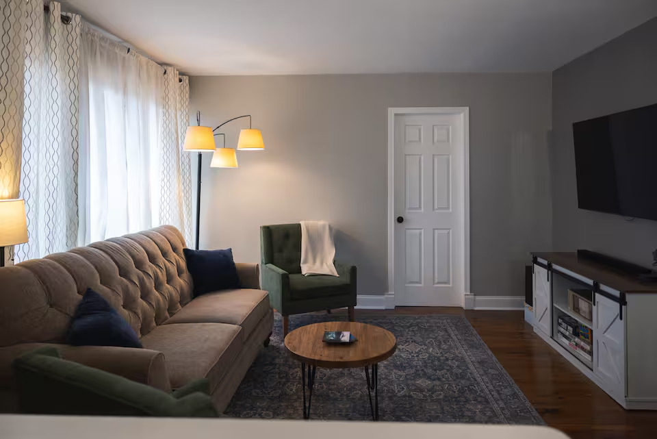 300 Division Street South Elgin, IL 60177 - Photo 3 of 23 a living room with furniture and a flat screen tv