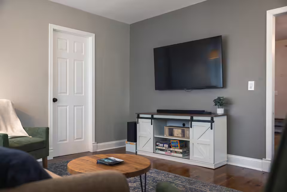 300 Division Street South Elgin, IL 60177 - Photo 5 of 23 a living room with furniture and a flat screen tv
