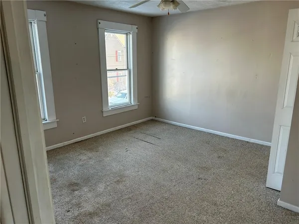 an empty room with windows