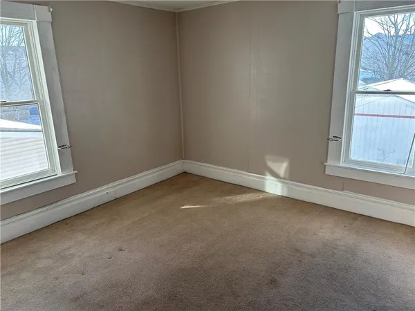 a view of a room that has window in it