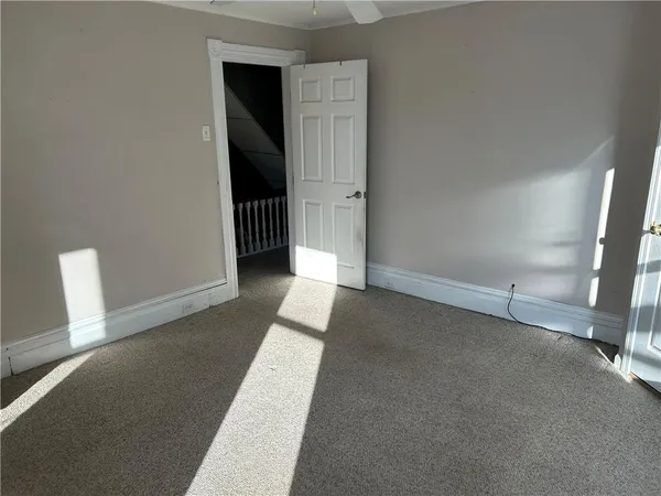a view of a room with an empty space