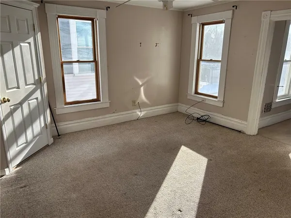 an empty room with windows
