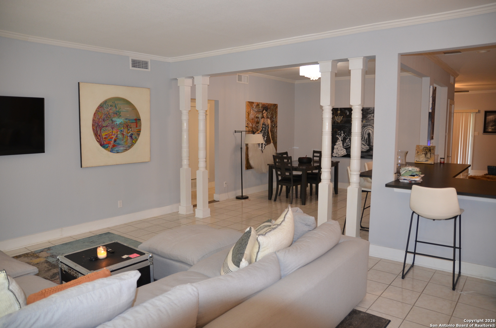 1819 Babcock Road, Unit 705G San Antonio, TX 78229 - Photo 14 of 22 a living room with furniture and a flat screen tv
