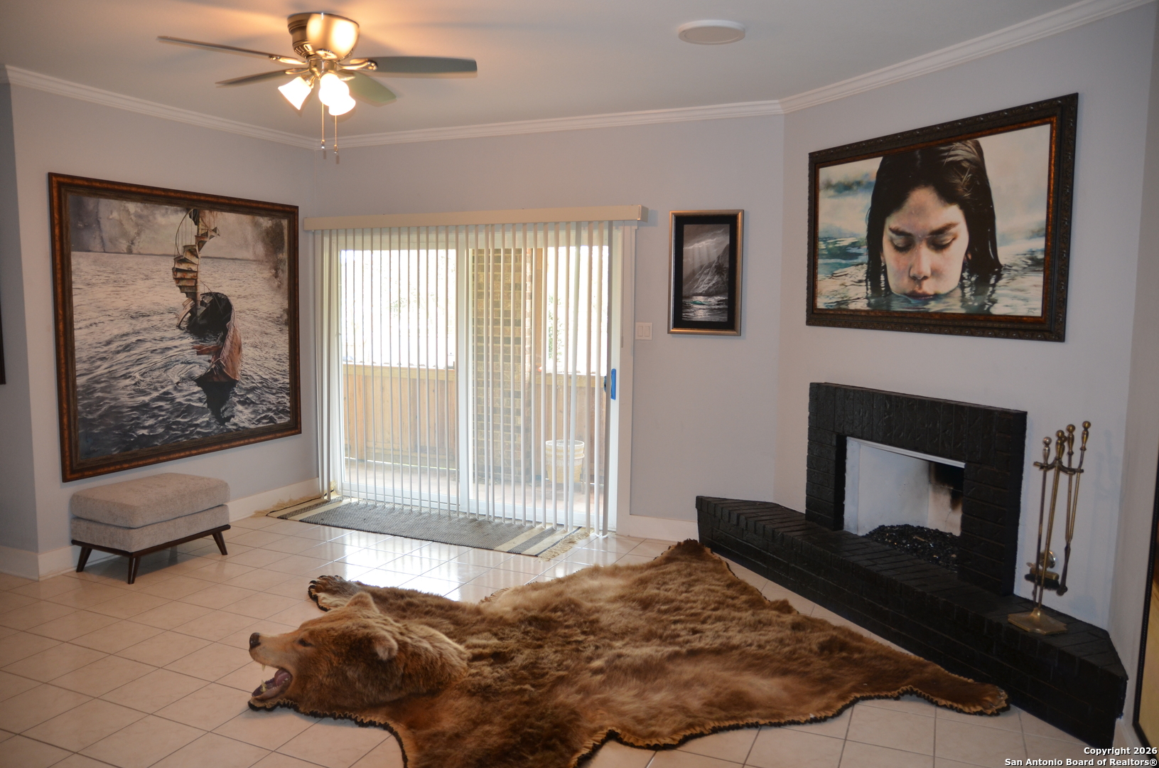 1819 Babcock Road, Unit 705G San Antonio, TX 78229 - Photo 19 of 22 a bedroom with a bed and a painting on the wall