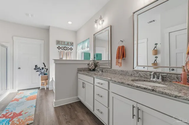 a aerial view of a house with a yard