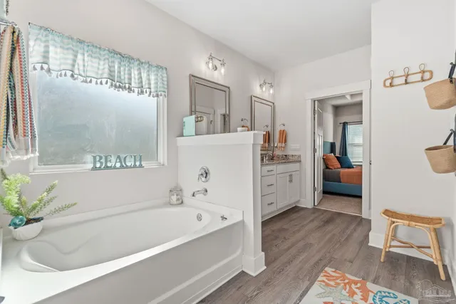 an aerial view of a house with a swimming pool